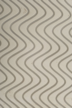 Wavy tread on the sole of a basketball shoe.