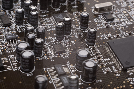 Close up on a dark and mysterious circuit board.の写真素材