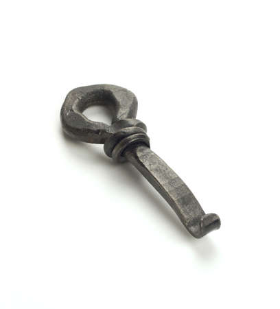 Vintage crown top bottle opener isolated on whiteの写真素材