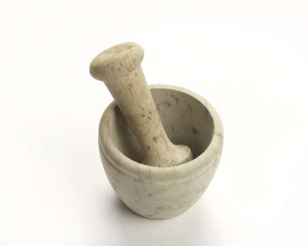  A mortar and pestle on white background の写真素材