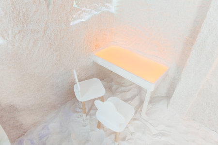 Interior of a room with a chair and a white wall.の写真素材