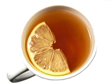 white cup of tea with piece of lemon                               の写真素材