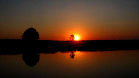 Sunset on the summer fishing                               の写真素材