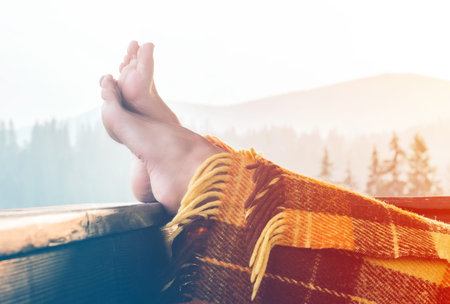 Woman relaxing in mountainsの写真素材