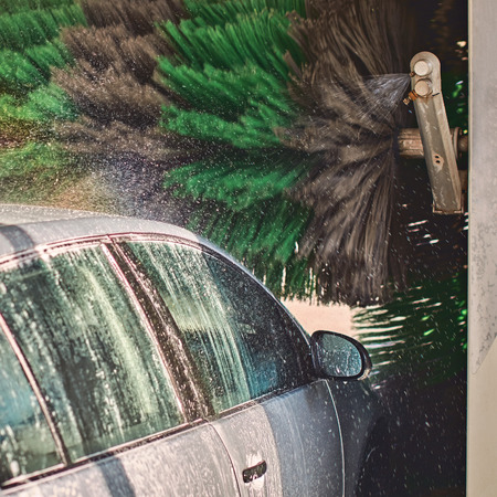 Automatic car wash service in actionの写真素材