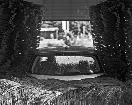 Automatic car wash service in action in black and whiteの写真素材