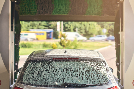 Clean automobile in car wash service interiorの写真素材