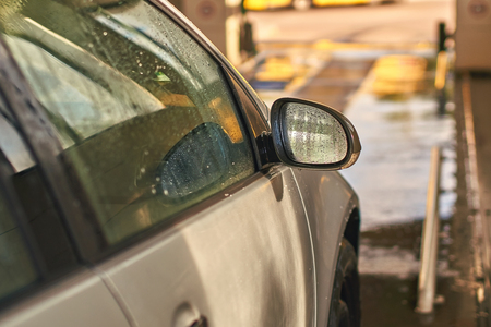 Clean automobile in car wash service interiorの写真素材