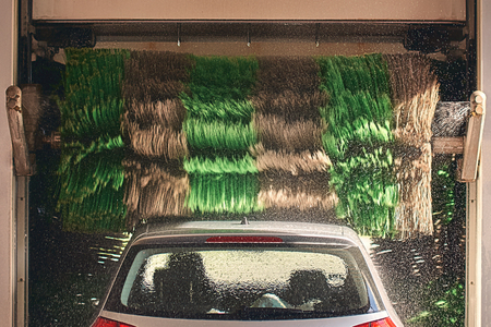 Automatic car wash service in actionの写真素材