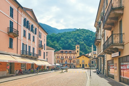 Beautiful view of Piazza Indipendenza or Independence Square in Bellinzona, Switzerland with an obelisk erected in 1803 to mark the centenary of the Act of Mediation and Sasso Corbaro castle on the hillのeditorial素材