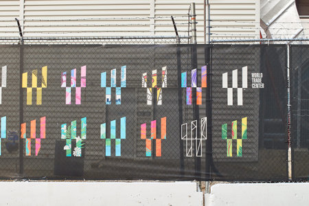 Colorful logos of World Trade Center on the fence in Lower Manhattan.