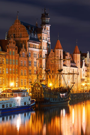 Night view of Gdansk harbor and Motlawa river, located in the Old Town of Gdansk city, Poland