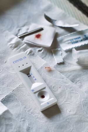 Negative test result by using rapid test device for COVID-19 novel coronavirus on a home kitchen...