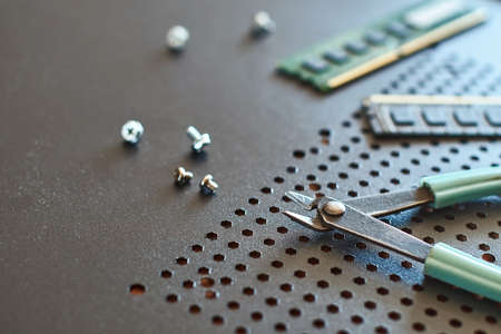 Table of a computer support engineering team with toolsの写真素材