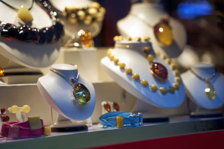Warsaw, Poland, Nov 15, 2018: Amber jewelry displayed on a shopfront in the city center.のeditorial素材