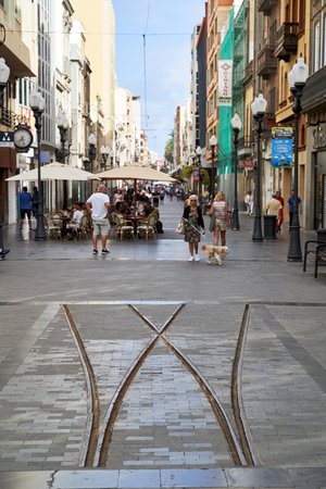 Old train rails at the main shopping street Calle Trianaのeditorial素材