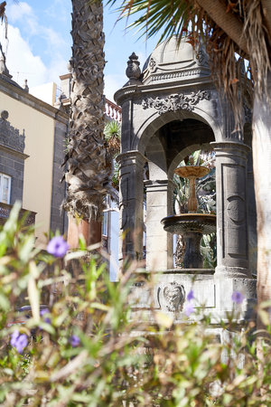 Covered medieval fountain at Plaza del Espiritu Santo in Vegueta, Las Palmas de Gran Canaria, Spainの写真素材