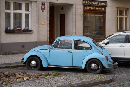 Side view of Vintage light blue Volkswagen VW Beetle car parked on the streetのeditorial素材