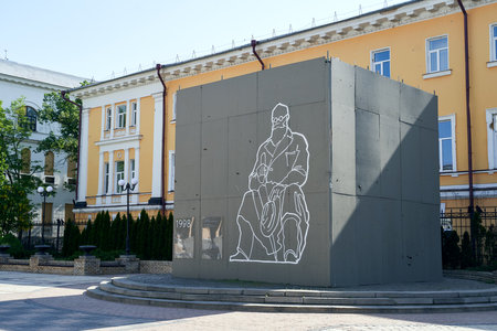 Monument to Mykhailo Hrushevsky Ukrainian academician, politician, historian and statesman protected from possible destruction during the Russian invasion of Ukraineのeditorial素材