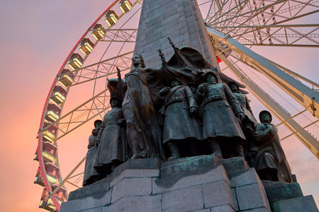 The Belgian Infantry Memorial with the giant Ferris wheel known as The View on backgroundの写真素材