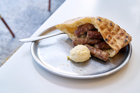 Sarajevo-style cevapi aka Sarajevski cevapi a national dish of Bosnia and Herzegovina