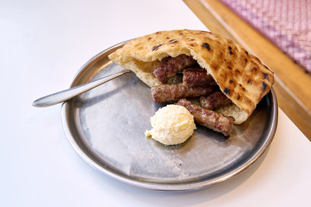 Sarajevo-style cevapi aka Sarajevski cevapi a national dish of Bosnia and Herzegovinaの写真素材