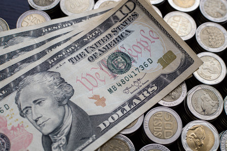 Open savings over a wooden table for financial crisis with Colombian coins