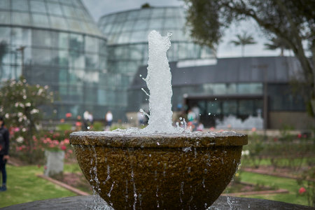 Fountain in the city park, close-up, blurred backgroundの写真素材