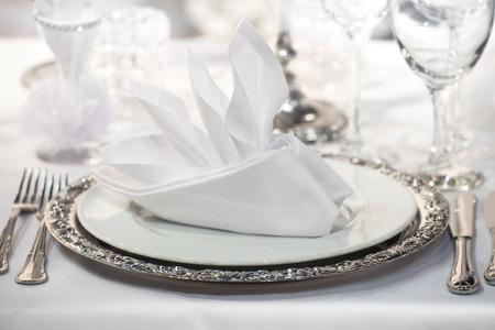 Fancy table set for a wedding party event on a tableの写真素材