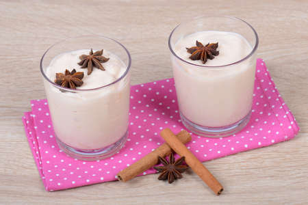 Joghurt with cinnamon and aniseの写真素材