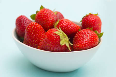 Fresh strawberries in a bowlの写真素材