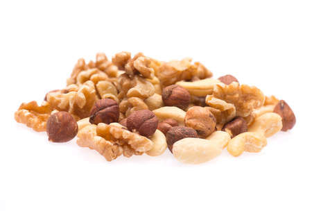 A mix of nuts isolated on a white backgroundの写真素材