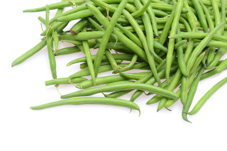 Fresh green string beans isolated on a white background