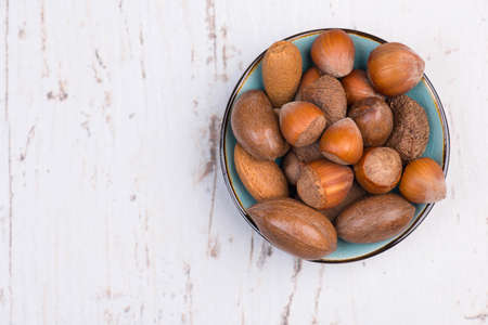 Mix of nuts on a texture backgroundの写真素材