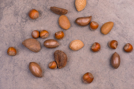 Mix of nuts on a texture background