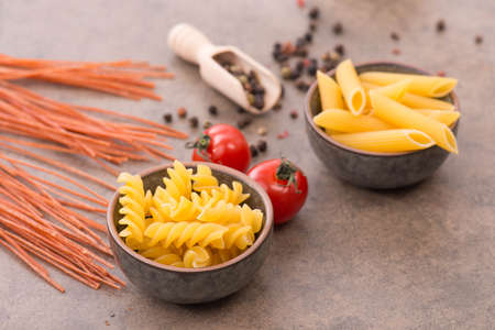 Different types of pasta, empty copy space for textの写真素材