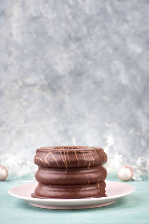 Traditional german christmas chocolate cake called Baumkuchen, winter season sweetsの写真素材