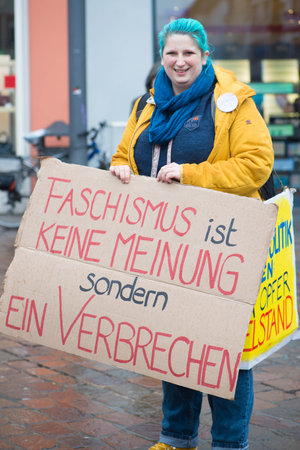 Demonstration in Trier on the 20.01.2021 against the covid-19 regulations in Germany, protest of the Antifa and the radical left wing against corona deniersのeditorial素材