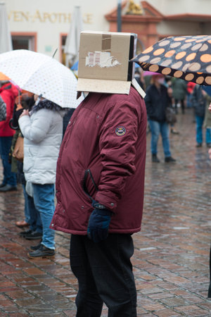 Demonstration in Trier on the 20.01.2021 against the covid-19 regulations in Germany, protest of the Antifa and the radical left wing against corona deniersのeditorial素材
