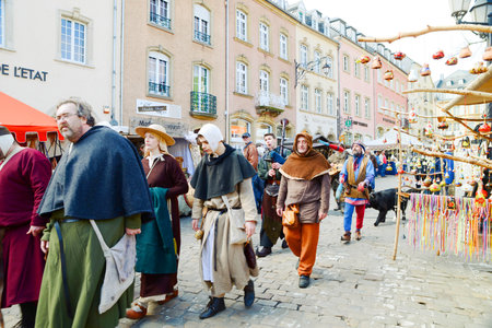 Traditional medieval Easter market in Echternach in Luxembourg, costs from middle age, pottery, herbs and more for saleのeditorial素材