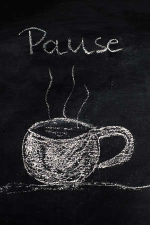 White chalk drawing of a mug of coffee on a dark blackboard, taking a break, lifestyleの写真素材