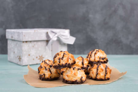 Coconut macaroons on a textured blue backgroundの写真素材