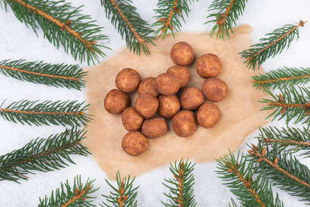 Marzipan potatoes, in german called Marzipankartoffeln, with cacao powder, sweets for christmasの写真素材