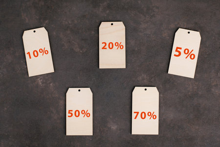 Price labels from with different discounts on a dark background