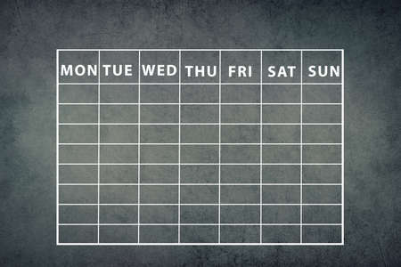 Schedule of the week on a dark textured background, curriculum schoolの写真素材