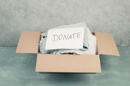 Package with used clothes for donation, second hand use for poor people, welfareの写真素材