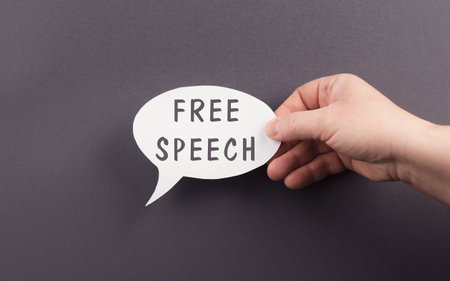 Speech bubble with the words free speech, cancel culture, having a different opinion, censorship, political issueの写真素材