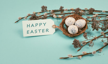 Easter holiday background, nest with small eggs, branches of pussy willow, greeting card, spring...