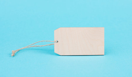 Empty price tag on a blue colored background, advertising for discount, black friday sale, blanc labelの写真素材