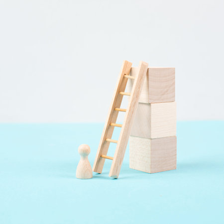 Man is standing next to a ladder, climbing up in career, having a goal, brainstorming for ideas,...
